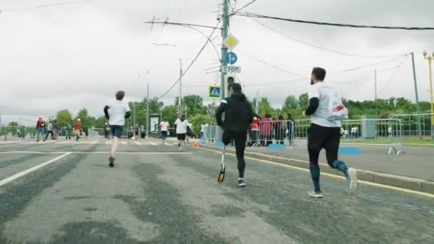 Corredor atlético com perna protética esportiva maratona de corrida — Vídeo de Stock