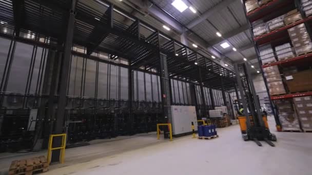 Inside view of huge modern factory full of tubes. pipelines and other equipment — Stock Video