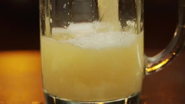 Close Unfiltered Beer Pouring Glass Standing Bar Counter Bubbles Rise — Stock Video