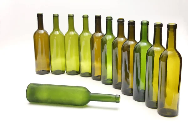 Empty bottles of wine on white background — Stock Photo, Image