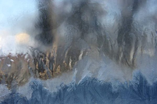 Covered with frozen ice window glass Stock Photo