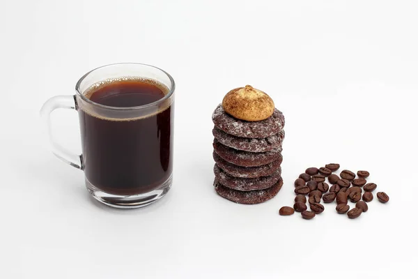 White cup of black coffee with biscuits and beans — Stock Photo, Image