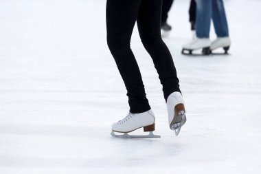 feet skating on the ice rink clipart