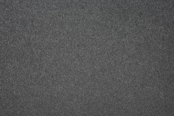 Textura de fondo de una pared gris arenosa — Foto de Stock