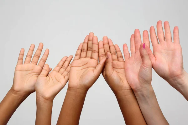 Many raised hands in a row — Stock Photo, Image