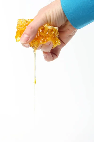 Honung från droppande ner händer — Stockfoto