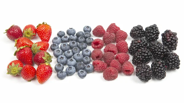 Blackberry, raspberry blueberry and strawberry on a white backgr — Stock Photo, Image
