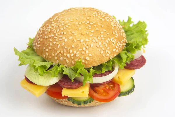 Hamburger with vegetables and sausage on a white background. Fas — Stockfoto