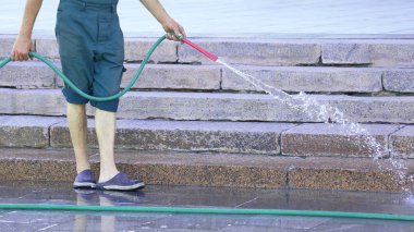 işçi şehir sokak sulama hortumu