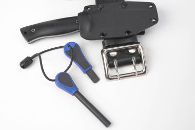 knife for tourism and hunting with a plastic case on a black lea