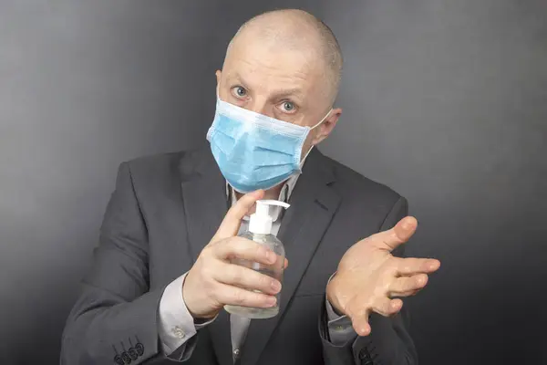 Man Protective Medical Mask Quarantine Disinfects His Hands Virus Using — Stock Photo, Image