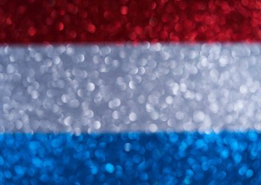 Hollanda bayrağının arkaplan resmi. Yeni yıl süsü. Pırıltıdan güzel bir arka plan, parıltı. Küçük ve büyük daireler