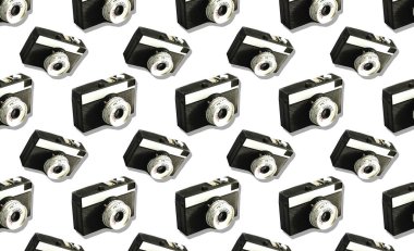 Beyaz arka planda eski bir film kamerası. İzole et. Desen arkaplanı