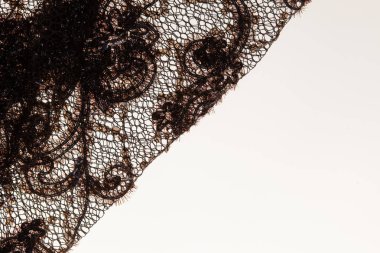 Beyaz arkaplan üzerine dantel kumaş