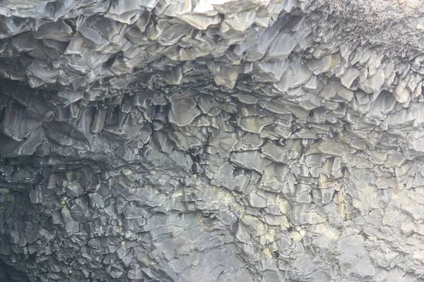 De textuur van de basalt grot in IJsland closeup — Stockfoto