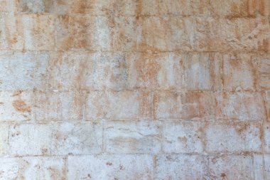 A dirty smudged old White bricks.