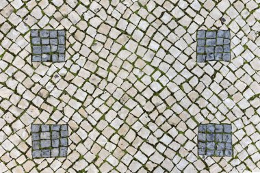Pavement, lined with old stone tiles