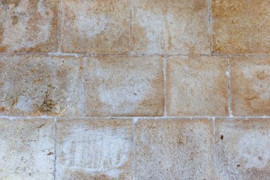 A dirty smudged old White bricks.