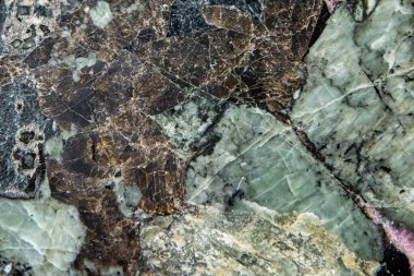 Taş dokusu ve arka plan. Kaya mineralinin eşsiz dokusu