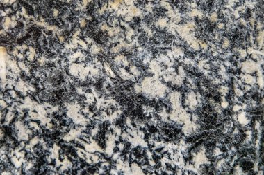 Taş dokusu ve arka plan. Kaya mineralinin eşsiz dokusu