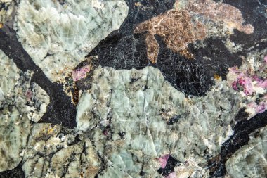 Taş dokusu ve arka plan. Kaya mineralinin eşsiz dokusu