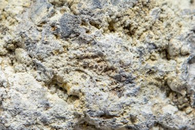 Taş dokusu ve arka plan. Kaya mineralinin eşsiz dokusu