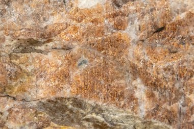 Taş dokusu ve arka plan. Kaya mineralinin eşsiz dokusu