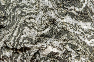 Taş dokusu ve arka plan. Kaya mineralinin eşsiz dokusu