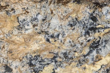 Taş dokusu ve arka plan. Kaya mineralinin eşsiz dokusu
