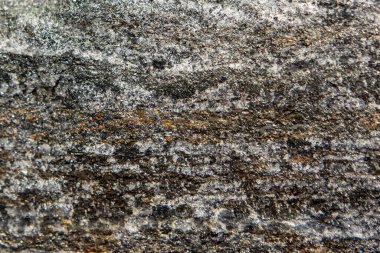 Taş dokusu ve arka plan. Kaya mineralinin eşsiz dokusu