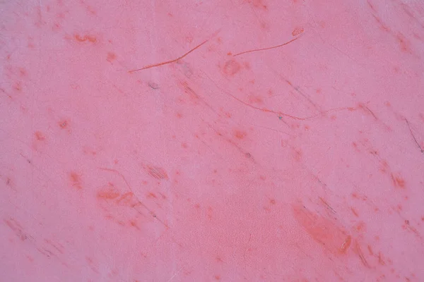 De textuur van de houten muren geschilderd in roze kleur. Achtergrond met krassen — Stockfoto