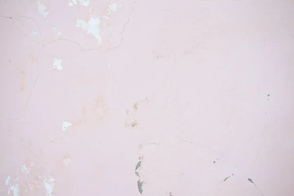 Muro di cemento rosa con scheggiature e graffi. Struttura invecchiata e sfondo — Foto Stock