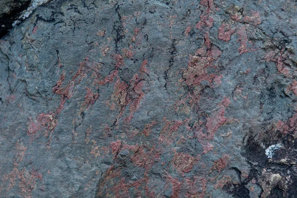 A textura e o fundo da pedra pré-histórica escura . — Fotografia de Stock