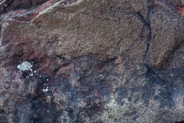 De textuur en achtergrond van donkere prehistorische steen. — Stockfoto