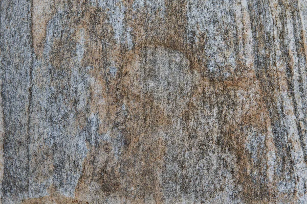 Hauptbeschaffenheit und Hintergrund aus Stein. Steinbruch mit Moos bewachsen — Stockfoto
