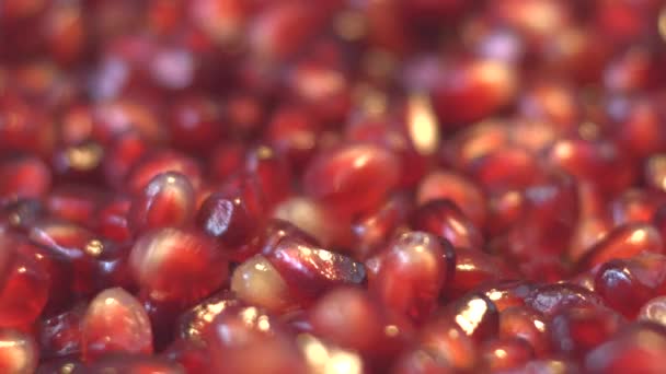 Pomegranate grains. 2 Shots. Slow motion. — Stock Video