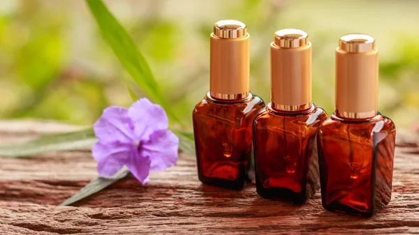 Three Spa cosmetics container and Purple flowers