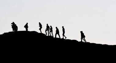 Yamaç çalışan insanlara