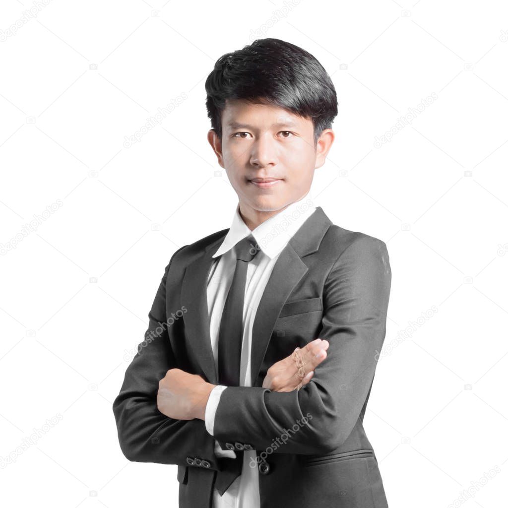 Portrait of a handsome businessman with arms folded. Isolated on