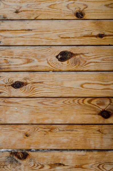 Natuurlijke houten achtergrond van een hek boards zonder verf — Stockfoto