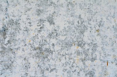 Çatlak ve delikler ile çimento gri duvar dokusu 