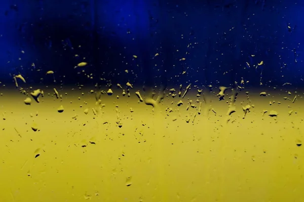 Raindrops Window Glass Blue Yellow Background Colors Ukrainian National Flag — Stock Photo, Image