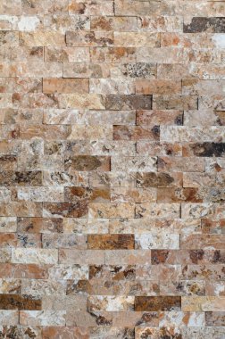 Arka plan bir taş duvar kaplama doku, kahverengi taş tuğla 