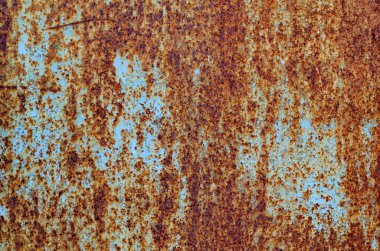 Arka plan bir paslı eski demir metal levha, turuncu ve kahverengi renkleri