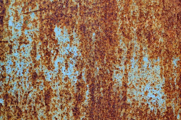 Achtergrond van een roestige oude IJzeren metalen plaat, oranje en bruine kleuren — Stockfoto