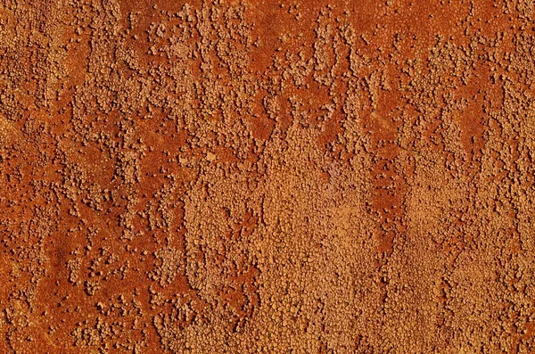Fondo de una vieja lámina de hierro oxidado, col naranja y marrón — Foto de Stock