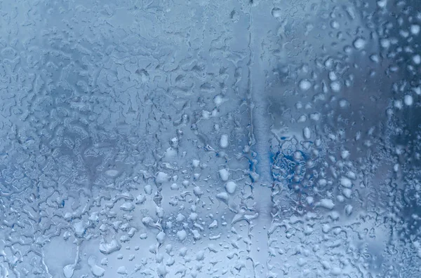 Regentropfen Und Gefrorenes Wasser Auf Fensterglashintergrund — Stockfoto