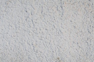 Arka plan beyaz sıva kaplamalı ve boyalı dış, kaba dökme çimento ve beton duvar doku, dekoratif kaplama 