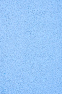 Arka plan mavi bir sıva ile kaplı ve boyalı dış, kaba dökme çimento ve beton duvar doku, dekoratif kaplama