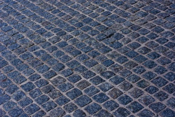 Geometry pattern of cobblestone background traditional stone paving
